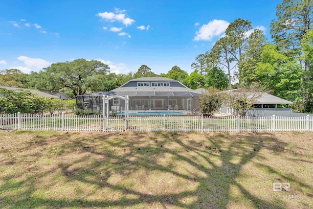 1352 W Fairway Dr, Gulf Shores, AL 36542 - view of yard featuring a fenced in pool, a fenced backyard, and glass enclosure