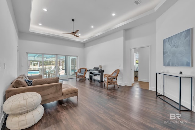 1352 W Fairway Dr, Gulf Shores, AL 36542 - living room featuring a ceiling fan, recessed lighting, wood finished floors, and a raised ceiling