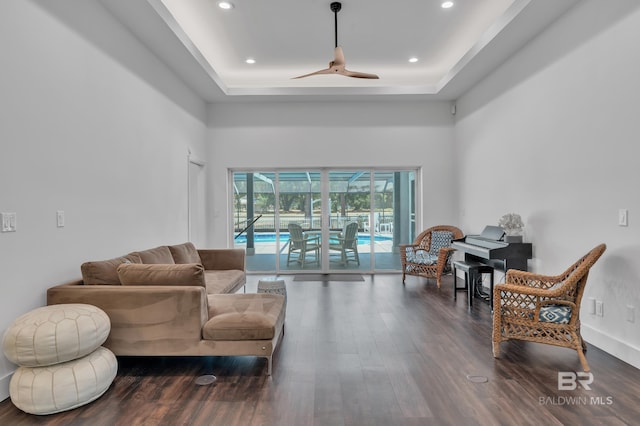 1352 W Fairway Dr, Gulf Shores, AL 36542 - sitting room featuring a ceiling fan, a tray ceiling, recessed lighting, and wood finished floors