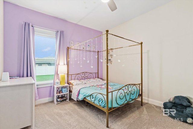 bedroom with carpet, baseboards, and ceiling fan