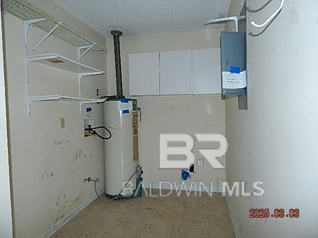 utility room with water heater