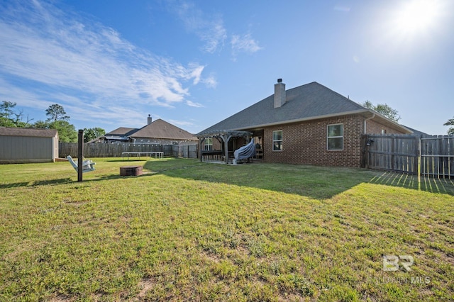 exterior space with a fenced backyard
