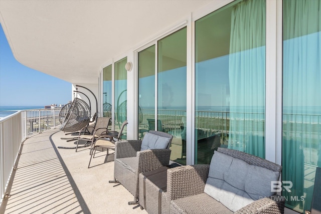 balcony featuring a water view