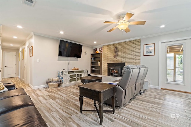 1101 Alabama Ave, Dauphin Island, AL 36528 - living area with ornamental molding, baseboards, ceiling fan, light wood-style floors, and recessed lighting