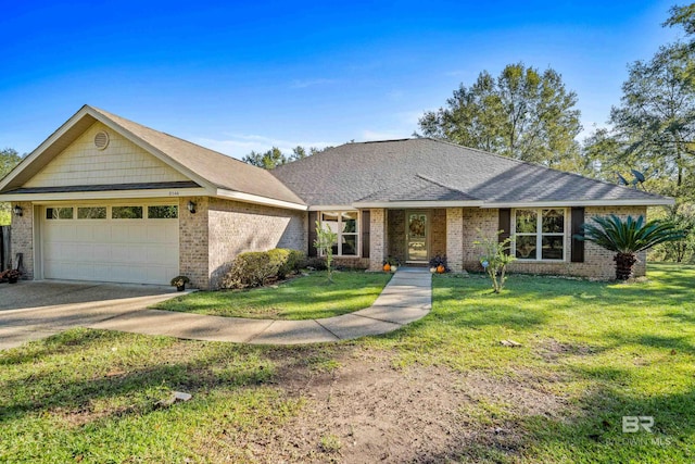 single story home with a front yard and a garage