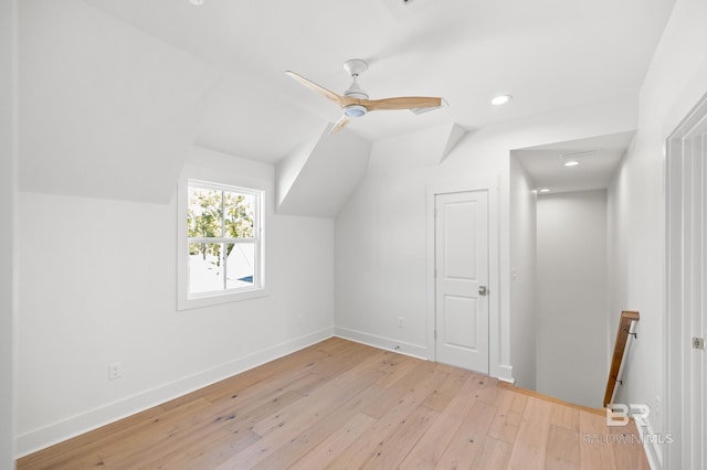 additional living space featuring ceiling fan, light hardwood / wood-style floors, and lofted ceiling