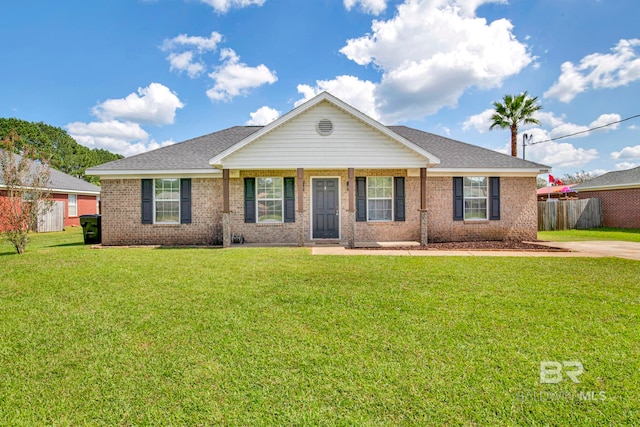 single story home with a front lawn