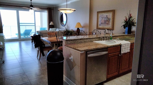 kitchen with stainless steel dishwasher, light tile floors, decorative light fixtures, ceiling fan, and sink