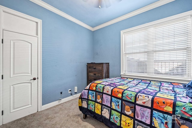 bedroom with ceiling fan, carpet floors, and ornamental molding