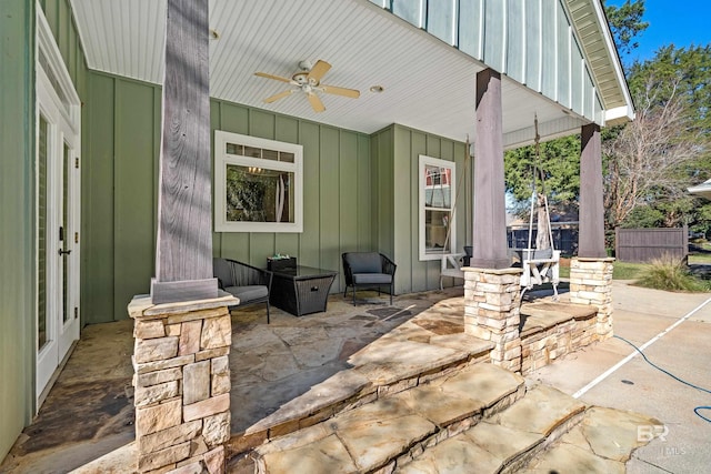 view of patio featuring ceiling fan