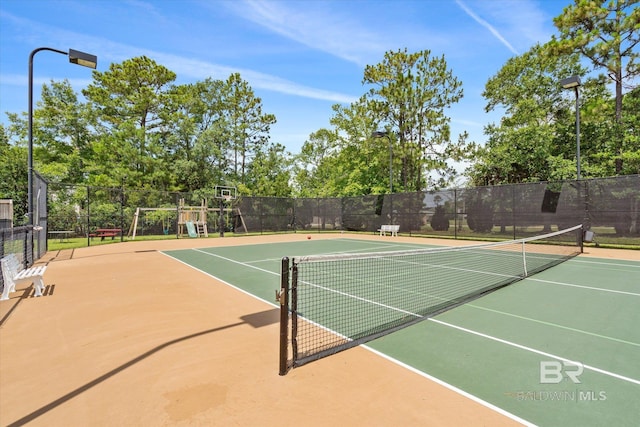 view of tennis court featuring basketball court