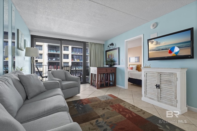 tiled living room with a textured ceiling