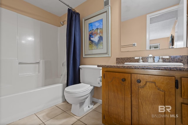 full bathroom with tile patterned flooring, shower / tub combo, vanity, and toilet