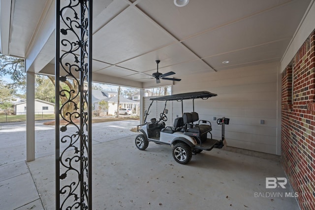 exterior space featuring ceiling fan