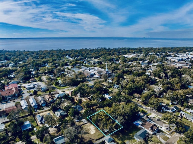 aerial view featuring a residential view and a water view