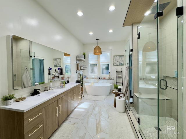 900 Hand Ave, Bay Minette, AL 36507 - full bathroom with vanity, a soaking tub, a shower stall, recessed lighting, and marble finish flooring