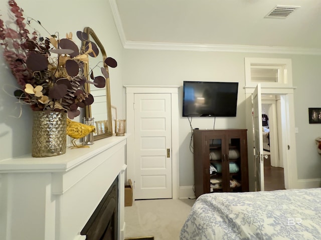 900 Hand Ave, Bay Minette, AL 36507 - bedroom with crown molding and light colored carpet