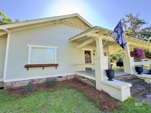 900 Hand Ave, Bay Minette, AL 36507 - view of front of house featuring covered porch and crawl space