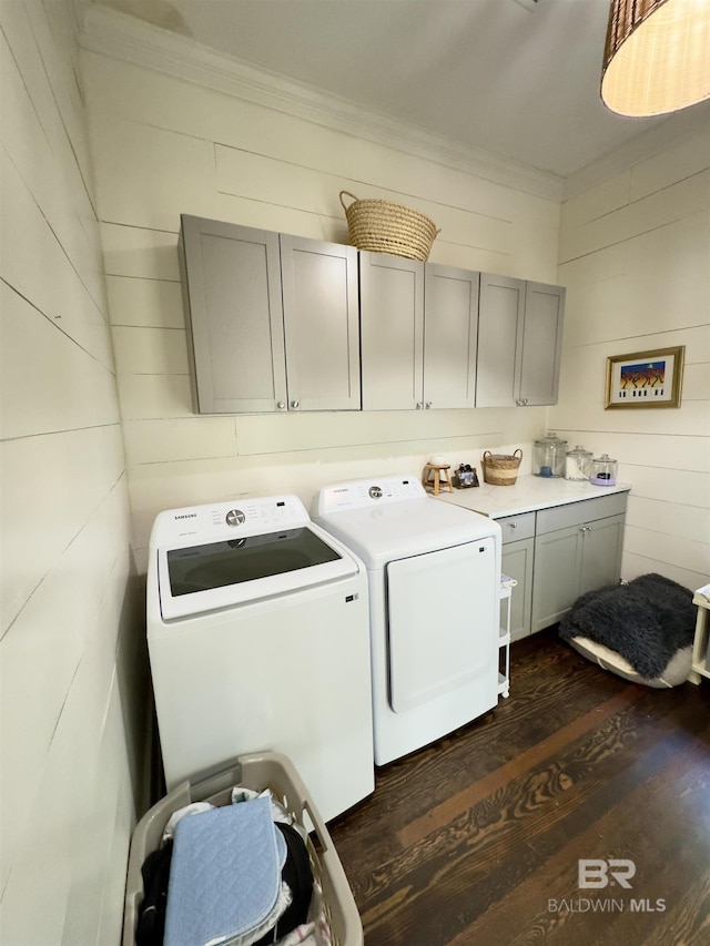 900 Hand Ave, Bay Minette, AL 36507 - laundry area with separate washer and dryer, dark wood-style floors, cabinet space, ornamental molding, and wood walls