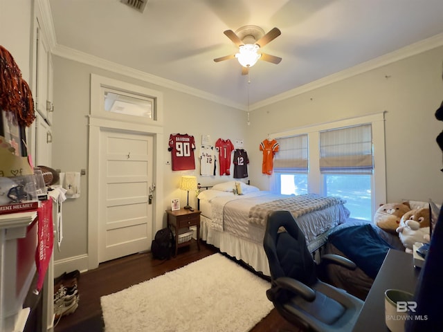 900 Hand Ave, Bay Minette, AL 36507 - bedroom featuring dark wood-type flooring, crown molding, and ceiling fan