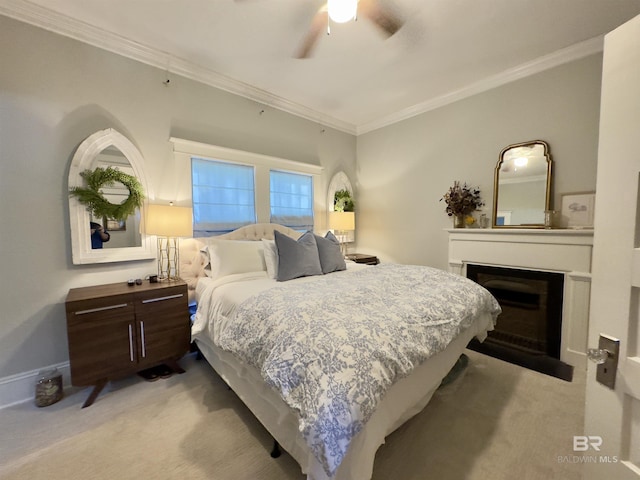 900 Hand Ave, Bay Minette, AL 36507 - carpeted bedroom featuring crown molding, a fireplace, baseboards, and ceiling fan