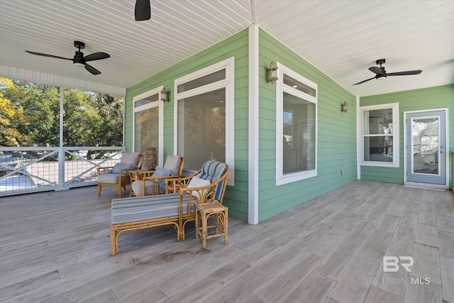 wooden deck with ceiling fan