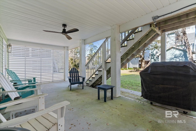 view of patio with ceiling fan and area for grilling