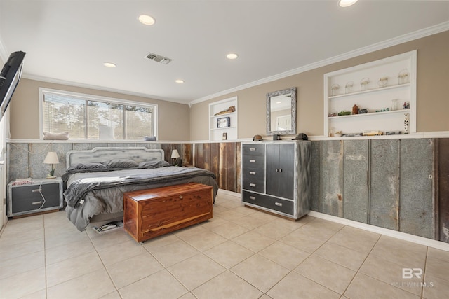 bedroom with crown molding and light tile patterned flooring