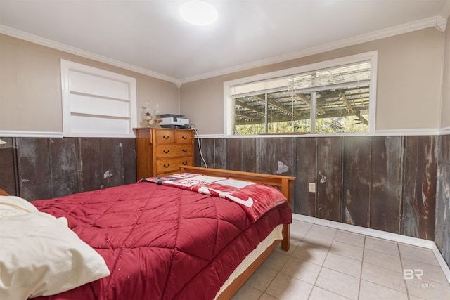 bedroom with tile patterned flooring and ornamental molding