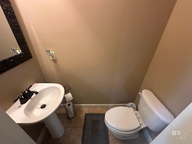 bathroom with sink and toilet