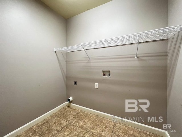 laundry area with washer hookup and hookup for an electric dryer