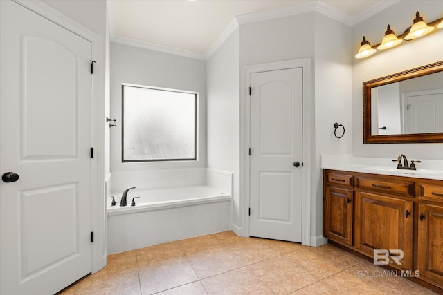 bathroom with crown molding, vanity, tile patterned flooring, and a washtub