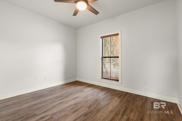 unfurnished room with hardwood / wood-style flooring and ceiling fan