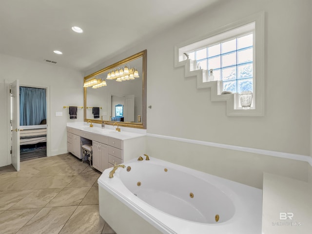 bathroom featuring tile patterned floors and vanity