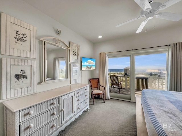 carpeted bedroom featuring multiple windows, ceiling fan, and access to exterior