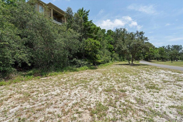 1430 Regency Rd Unit C103, Gulf Shores, AL 36542 - view of yard featuring a balcony