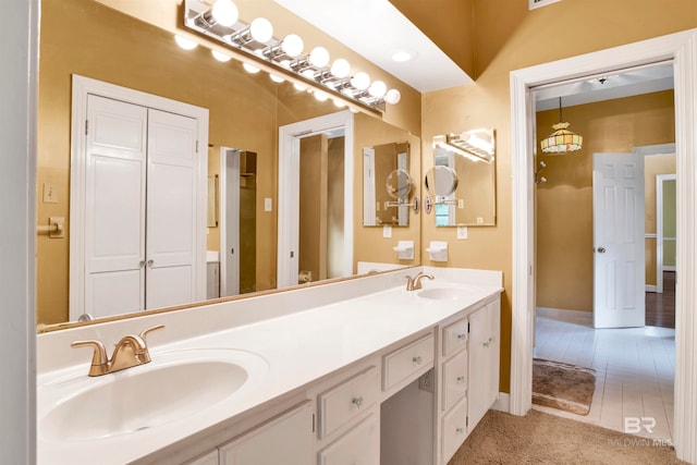 bathroom with vanity and tile patterned floors