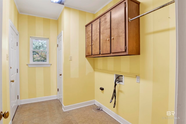 laundry area with cabinets, washer hookup, and ornamental molding