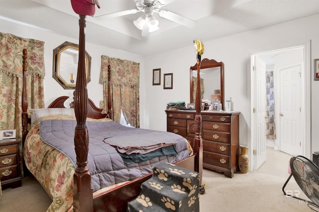 bedroom featuring light colored carpet and ceiling fan