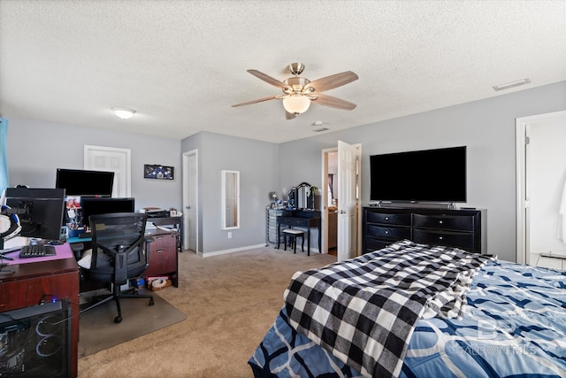 bedroom featuring visible vents, carpet, ceiling fan, and a textured ceiling