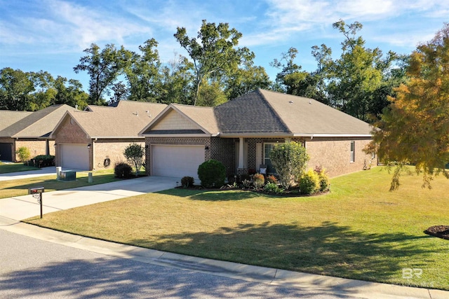 ranch-style home with a garage and a front yard