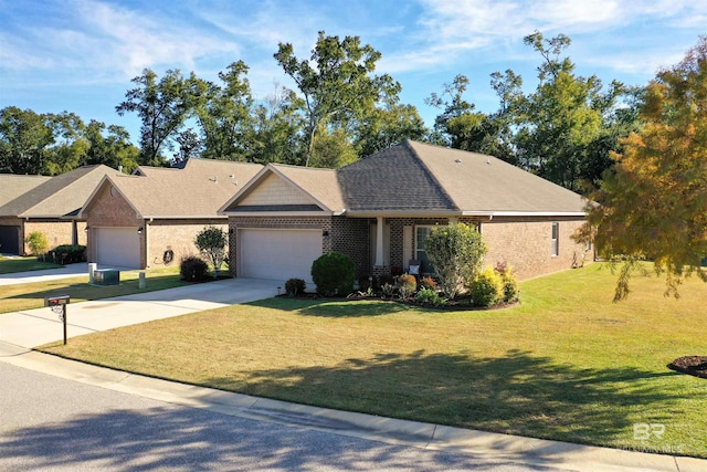 1234 Surrey Loop, Foley, AL 36535 - ranch-style house with a garage, a front lawn, brick siding, and concrete driveway
