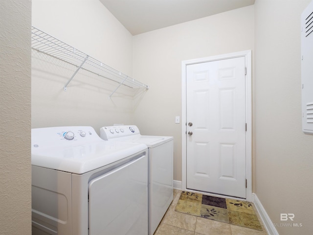 washroom with independent washer and dryer