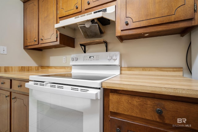 kitchen featuring white electric range