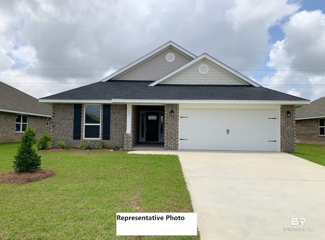 view of front of property with a front lawn and a garage