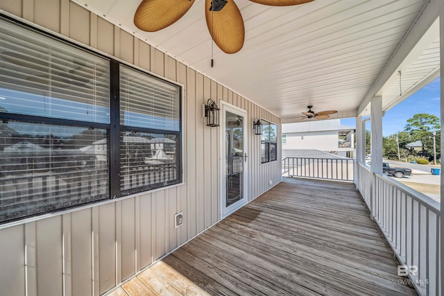 wooden deck with ceiling fan