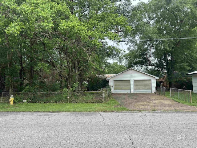 detached garage with fence