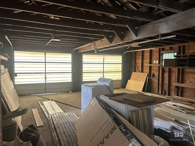 garage featuring washer and dryer