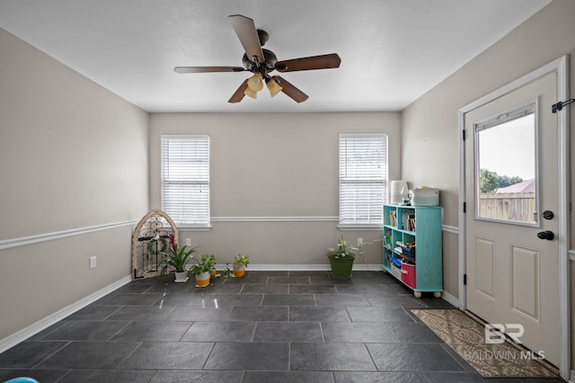 129 Oakwood Ave, Fairhope, AL 36532 - playroom with plenty of natural light, ceiling fan, and baseboards
