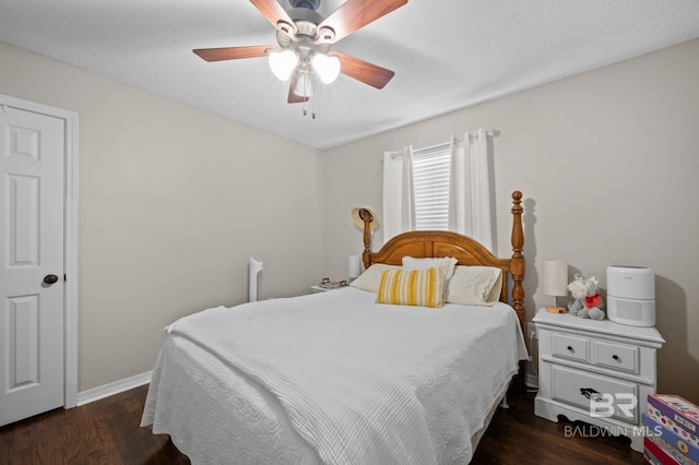 129 Oakwood Ave, Fairhope, AL 36532 - bedroom with wood finished floors, baseboards, and ceiling fan